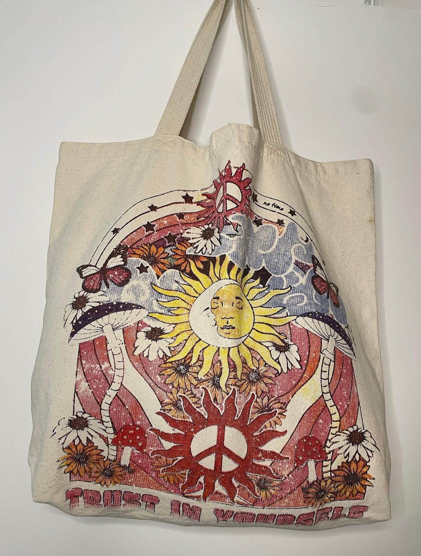 Borsa in tela di cotone grezzo con chiusura in velcro, stampa artistica sole e pace e scritta Trust in Yourself