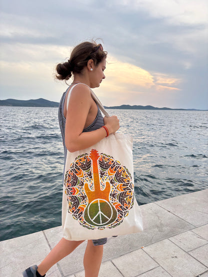 Borsa in tela di cotone grezzo con chiusura in velcro, stampa chitarra e simbolo della pace in stile boho