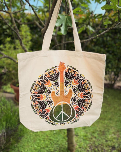 Borsa in tela di cotone grezzo con chiusura in velcro, stampa chitarra e simbolo della pace in stile boho