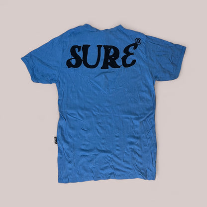 T-shirt blue unisex con ritratto floreale di Jimi Hendrix in bianco e nero e scritta “Back to Basic” by Sure, back